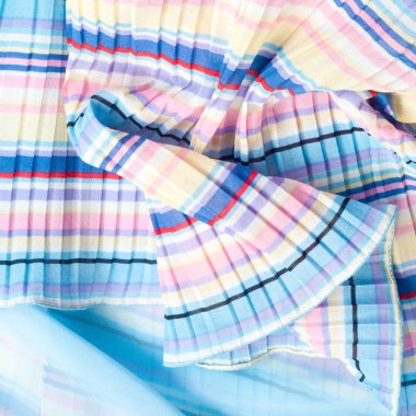 Pileli kumaş. Sinii sarı kırmızı beyaz çizgili doku. Fotoğraf stüdyosu