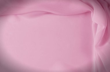 Doku, arka plan, desen. İpek kumaş soluk pembe, soyut kıvrımlar