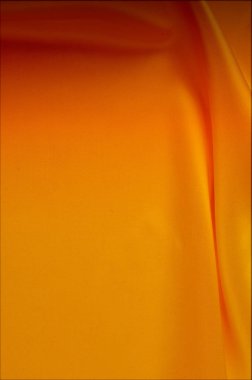 Doku, arka plan, desen. Kırmızı, sarı altın tonları ipek kumaş, metin alanı. Doğal doku üzerinde dayalı altın saten doku, kırmızı ipek arka plan