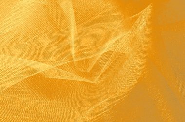 Doku, arka plan, desen. Sarı ipek kumaş. Pürüzsüz zarif altın ipek arka plan olarak kullanabilirsiniz. Altın saten Tekstil arka plan. 