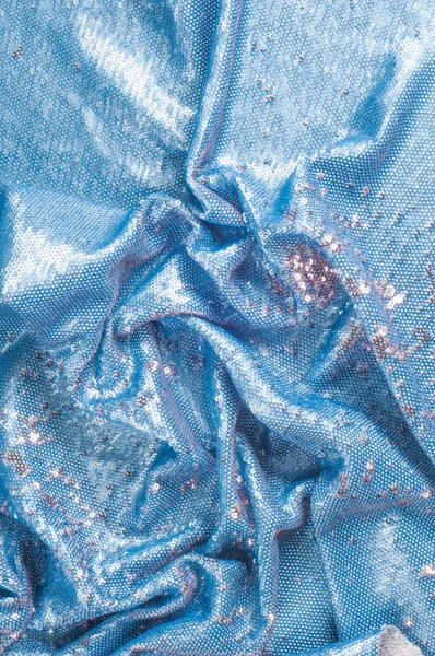 Doku, arka plan, desen. İpek kumaş ile payetler işlemeli mavi rengini sparkles yansıtan güneş ışınlarının