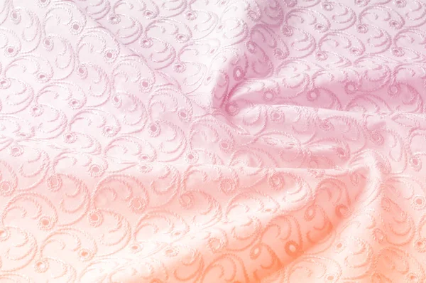 Doku arka planını kumaş. Bez delikli daireler ile. Kumaş dokusuna pastel tonlarda pembe renk, pembe pamuk bez doku arka planda pastel renkler close-up boyalı.