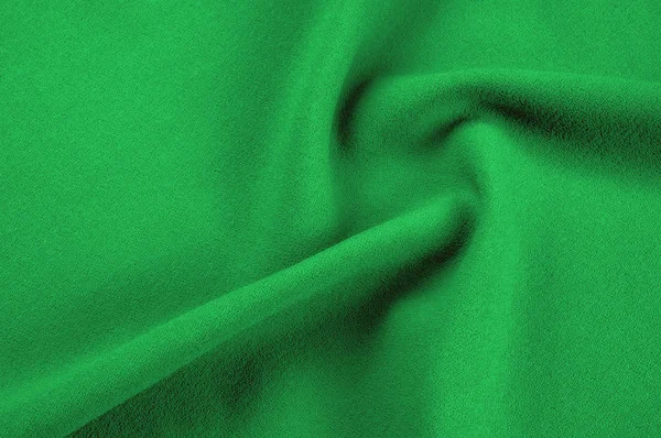 Doku, arka plan, desen. Yeşil, salata renkli ipek kumaş. Yeşil kumaş dokusu. Yeşil kumaş doku ve arka plan görünümünü kapatın. Arka plan ve doku tasarımcılar için.