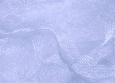 Doku, arka plan, desen. Tül pastel tonları. Mor katlanmış dantel kapatın. Arka plan olarak pastel mor buruşuk tül. Makro görünümü dikiş elbise. Saf düğün Tekstil.