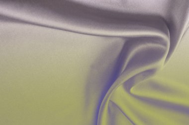 Kumaş arka plan doku. Gri mavi ipek kumaş. Doku yazıtlar için. Lüks kumaşlar veya sıvı dalgalar bir arka plan veya dalgalı kıvrımları gibi ipek saten malzemeden grunge doku parçası