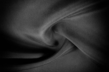 Yumuşak odak kumaş ipek siyah. Bu siyah yıkanmış ipek evinize götürün! Yıkanmış siyah renk yumuşak ve ipeksi bir koludur. İnce ve hafif, yumuşak siluetleri oluştururken göze çarpan bir sıvı örtüsü vardır.