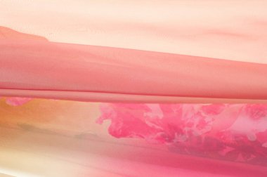 Pembe kumaş çiçek işlemeli. doku. Stüdyo fotoğrafı