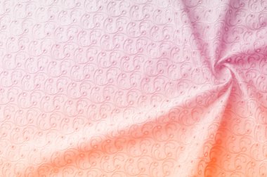 Doku arka planını kumaş. Bez delikli daireler ile. Kumaş dokusuna pastel tonlarda pembe renk, pembe pamuk bez doku arka planda pastel renkler close-up boyalı.