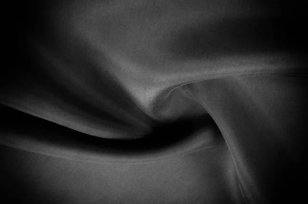 ソフト フォーカス布シルク黒 この黒の洗浄絹を取るホーム 洗浄の黒い色は柔らかく 絹のような手です 薄くて それは際立っている柔らかいシルエットを作成するとき液体ドレープ — ストック写真