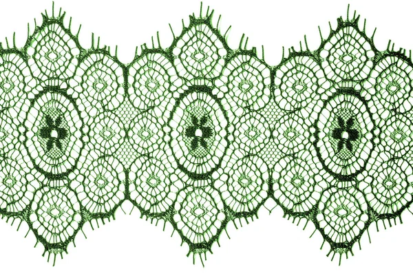 doku, arka plan, desen. dantel kumaş. yeşil. İşlemeli çiçekler açar her iki kenarları boyunca sınırında çarpıcı, süre düzensiz büyür saf tül ortasından.