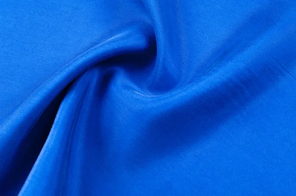 Arka plan doku, desen. Mavi renk kalın kalın ipek kumaş. Bu süper ağır ve çok yoğun polyester kumaş ile bina herhangi bir tasarım, lüks bir dokunuş eklemek.