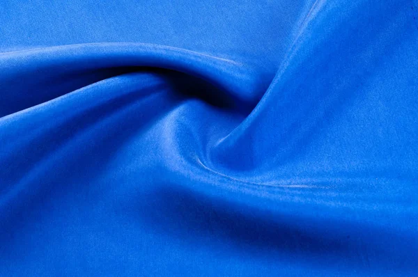 Arka plan doku, desen. Mavi renk kalın kalın ipek kumaş. Bu süper ağır ve çok yoğun polyester kumaş ile bina herhangi bir tasarım, lüks bir dokunuş eklemek.