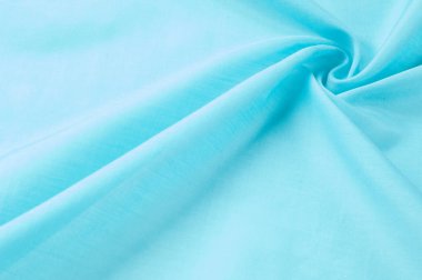 Doku arka planını kumaş. Mavi kumaş, aqua, mavi, Bondi mavi, gök mavisi, mavi mavi, pembe yumurta mavi, Skobelov, Turkuaz, çiçek adları ipek. İpek veya saten yumuşak zarif mavi bir arka plan olarak kullanılabilir