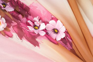 Pembe kumaş çiçek işlemeli. doku. Stüdyo fotoğrafı