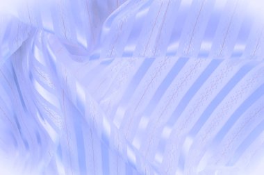 Arka plan doku, desen. Pastel. Bir ışık şerit ile Mavi ipek kumaş. Pürüzsüz zarif mavi ipek veya saten lüks kumaş dokusunu bir arka plan kullanılabilir. Lüks arka plan tasarım