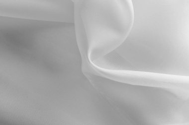 Doku, arka plan, desen. İpek kumaş şeffaf, beyaz renkte. Soyut yumuşak şifon doku arka plan. Eğri ve dalga ile yumuşak beyaz şifon