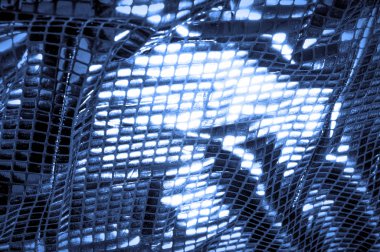 doku, arka plan, desen. Kumaş ile mavi renk büyük parıldıyor. Bu tek tük parıldıyor ile bazı tarzı göstermek! Polyester örgü yüzey üzerinde dağınık, mavi ve beyaz pullu vardır,