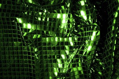 doku, arka plan, desen. Büyük yeşilden bir kumaş. Dikkat çekmek için hazır büyük sparkles bu çok renkli yağ lekeleri ile keskin bir göz oluşturmak.