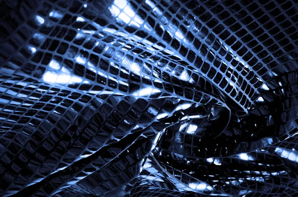 doku, arka plan, desen. Kumaş ile mavi renk büyük parıldıyor. Bu tek tük parıldıyor ile bazı tarzı göstermek! Polyester örgü yüzey üzerinde dağınık, mavi ve beyaz pullu vardır,