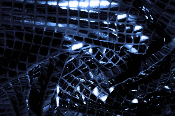 doku, arka plan, desen. Kumaş ile mavi renk büyük parıldıyor. Bu tek tük parıldıyor ile bazı tarzı göstermek! Polyester örgü yüzey üzerinde dağınık, mavi ve beyaz pullu vardır,