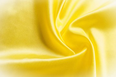 Doku arka plan deseni. İpek kumaş, sarı kumaş. Siyah bir arka plan üzerinde. Çiçek Tekstil veya kumaş. Kumaş dokusuna. Kumaş, tekstil, kumaş, dokuma malzeme,.