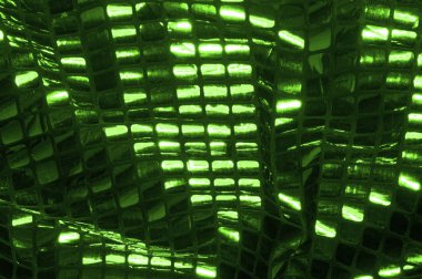 doku, arka plan, desen. Büyük yeşilden bir kumaş. Dikkat çekmek için hazır büyük sparkles bu çok renkli yağ lekeleri ile keskin bir göz oluşturmak.