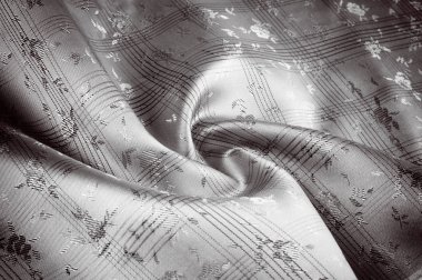 Doku arka plan deseni. İpek kumaş kahverengi, çikolata sütlü renk, carnelian, burnt sienna, alev, şehvet, Trabzon hurması, renk ile. Soyut lüks kumaş arka plan ya da sıvı dalgalar veya dalgalı grunge kıvrımlar