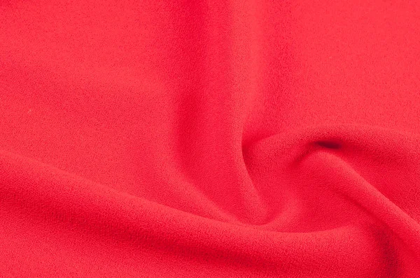 Texture, background, pattern. Red cloth. Abstract red background. Red abstract fabric background or liquid waves Illustration of wavy silk folds