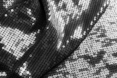  doku kumaş siyah ile bu malzeme hangi tarihlerde muhakkak bu Parlatıcı, her hareketi ile bir soundtrack oluştururken ışık georgette boyunca asılı bir dairesel mat payetler vardır.