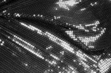  doku kumaş siyah ile bu malzeme hangi tarihlerde muhakkak bu Parlatıcı, her hareketi ile bir soundtrack oluştururken ışık georgette boyunca asılı bir dairesel mat payetler vardır.