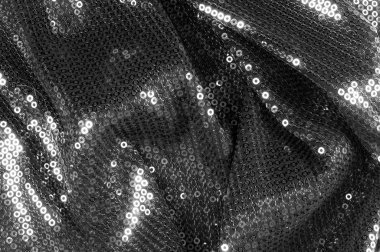  doku kumaş siyah ile bu malzeme hangi tarihlerde muhakkak bu Parlatıcı, her hareketi ile bir soundtrack oluştururken ışık georgette boyunca asılı bir dairesel mat payetler vardır.