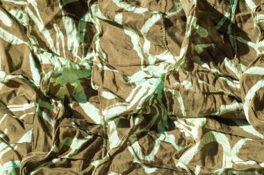 Doku, arka plan, desen. Kadın etek. Kumaş Pamuk koruyucu renk haki. Mat kahverengi-sarı renkli, özellikle, bir güçlü pamuk kumaş tekstil kumaş olduğunu