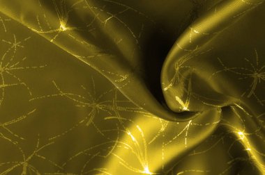 doku ipek kumaş desen ile altın sarısı. Bu hardal kadife tanıtımı sofistike beklenmedik bir Parlatıcı ekleyin. Yumuşak ışık kadife çökmüş altın şakacı twirled tasarımında gösteriyor.