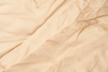 Doku arka planını kumaş. Bej kumaş. İpek kumaş duvar kağıdı doku arka plan deseni sepya pastel sarı krem bej renk tonu: güzel doğal ipek dokulu Tekstil