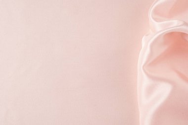 Doku, arka plan, desen. Kumaş ipek pembe arka plan. Güzel pembe saten. Perdelik arka plan. rüzgarlar dalgalar, kıvrımları güzel bir arka plan oluşturma.