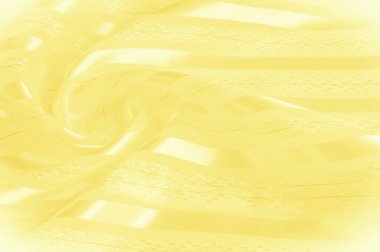 Arka plan doku, desen. Hafif bir şerit ile sarı ipek kumaş. Sarımsı doku. Pürüzsüz zarif sarı saten arka plan.