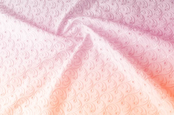 ファブリックのテクスチャ背景 穴あきの円の布 生地の質感はピンク色 パステル カラーのピンクの綿の布テクスチャ背景のクローズ アップのパステル トーンで描かれています — ストック写真