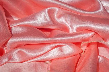 Doku, arka plan, desen. Astar kadın elbise ışık turuncu, turuncu bez astar. Kumaş mercan ipek