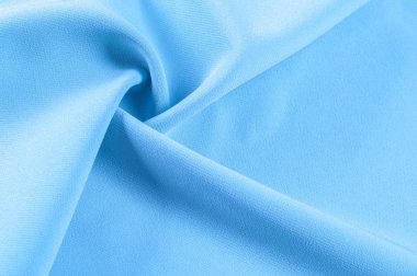 Arka plan doku, desen. Kumaş mavidir. Pistlerin parlak renklerle dolu, bu yüzden bu emaye işi mavi Stretch pamuk eğilim üzerinde kalmak pamuklu kadife kanca! Yumuşak parlak mavi renk vardır