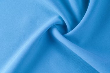 Arka plan doku, desen. Kumaş mavidir. Pistlerin parlak renklerle dolu, bu yüzden bu emaye işi mavi Stretch pamuk eğilim üzerinde kalmak pamuklu kadife kanca! Yumuşak parlak mavi renk vardır