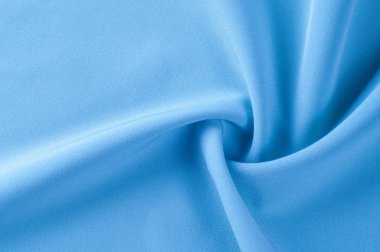 Arka plan doku, desen. Kumaş mavidir. Pistlerin parlak renklerle dolu, bu yüzden bu emaye işi mavi Stretch pamuk eğilim üzerinde kalmak pamuklu kadife kanca! Yumuşak parlak mavi renk vardır