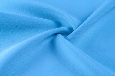 Arka plan doku, desen. Kumaş mavidir. Pistlerin parlak renklerle dolu, bu yüzden bu emaye işi mavi Stretch pamuk eğilim üzerinde kalmak pamuklu kadife kanca! Yumuşak parlak mavi renk vardır