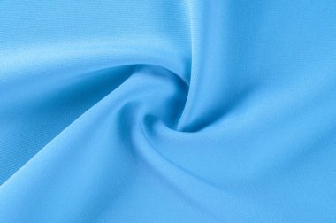 Arka plan doku, desen. Kumaş mavidir. Pistlerin parlak renklerle dolu, bu yüzden bu emaye işi mavi Stretch pamuk eğilim üzerinde kalmak pamuklu kadife kanca! Yumuşak parlak mavi renk vardır