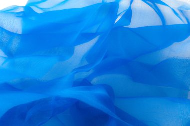 Yumuşak odak. doku, desen. Kumaş mavidir. ipek kumaş saydamdır. Bu tüm tasarım stüdyoları için çok önemlidir. Bu bitiş polyester mesh ve herhangi bir giysi, esnek bir türüdür.