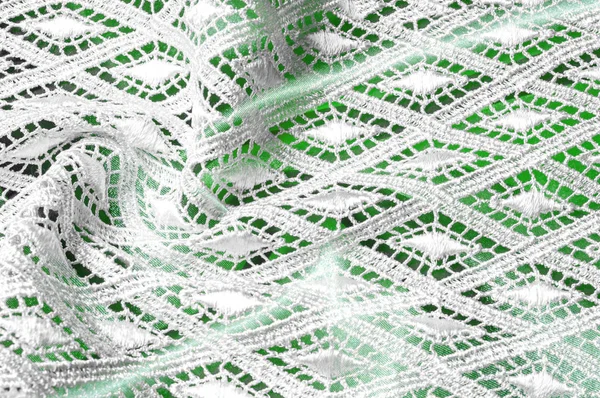 Doku arka plan deseni. Dantelli beyaz kumaş. Beyaz arka plan üzerinde el dantel. Beyaz guipure, nakış kumaş bir gelinlik, kartpostal, fotoğraf duvar kağıtları, afiş için,