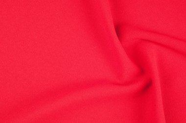 Doku, arka plan, desen. Kırmızı kumaş. Kırmızı arka plan. Kırmızı soyut kumaş arka plan ya da sıvı dalgalar dalgalı ipek kıvrımlar çizimi