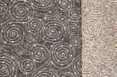 Doku, kumaş, arka plan. Altın iplik iplik ile bir daire desenli dantel kumaş