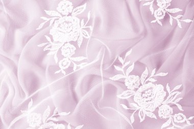 Doku, arka plan, desen. Dantelli beyaz kumaş. Çiçek dantel kumaştan yapılmış. Pembe ipek kumaş. tebrik kartı. Masaüstü duvar kağıdı. Tasarımcı için ekran koruyucu zemin
