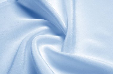 Doku arka plan deseni. Mavi ipek kumaş. Portre sakinleştirmek mavi ipek kumaş. Reklam alanı. Pürüzsüz zarif mavi ipek düğün arka plan olarak kullanılabilir.