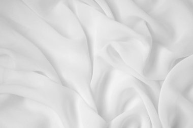 Doku, arka plan, desen. Beyaz renk, soyut kıvrımlar ipek kumaş